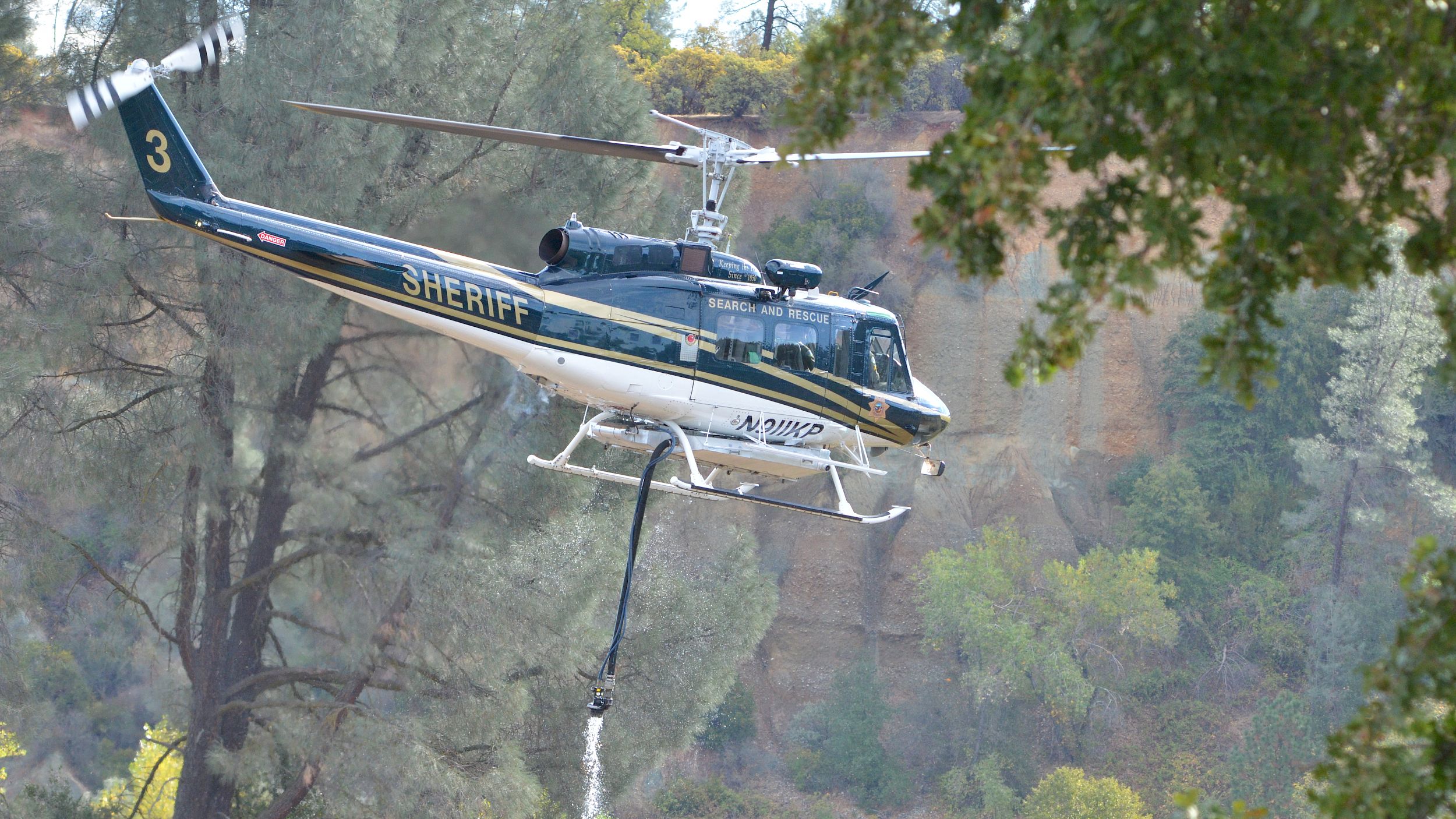 Helicopter dipping firefighting hose